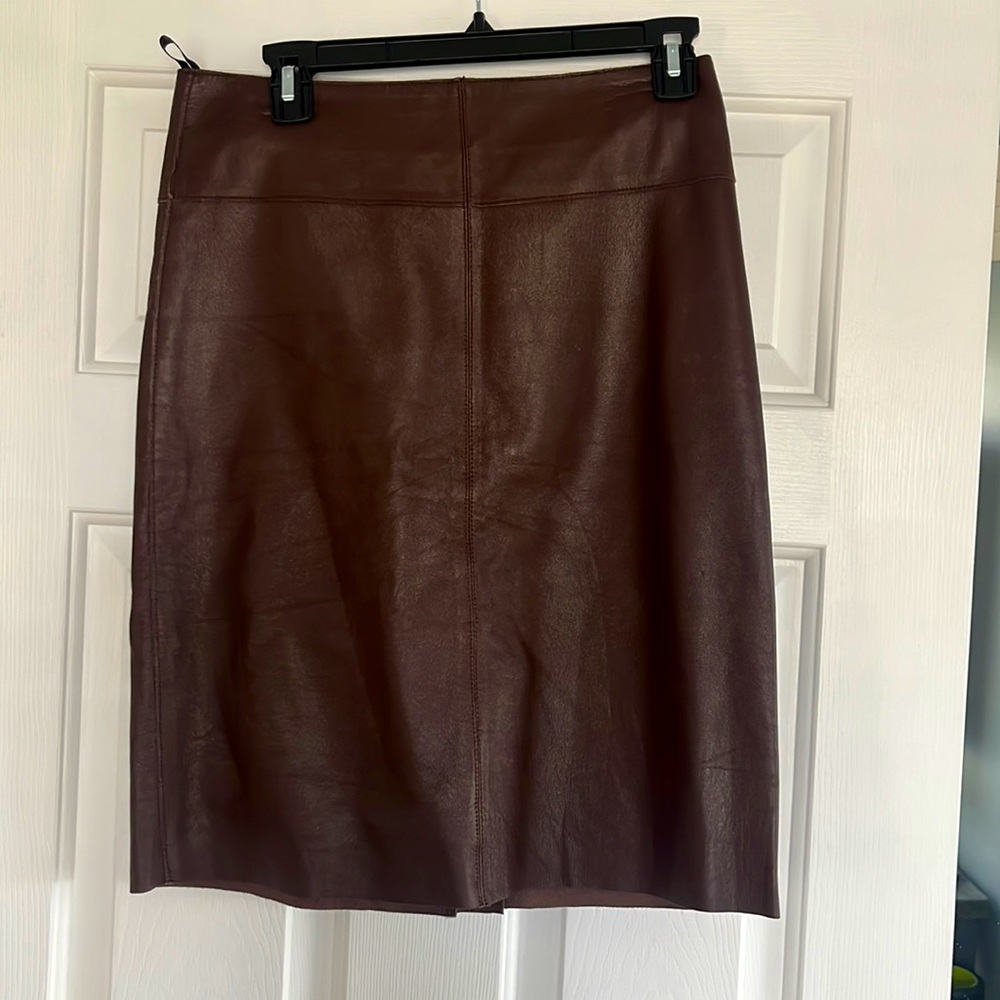 Brand new with tags Full grain 100% leather pencil skirt. Size 6